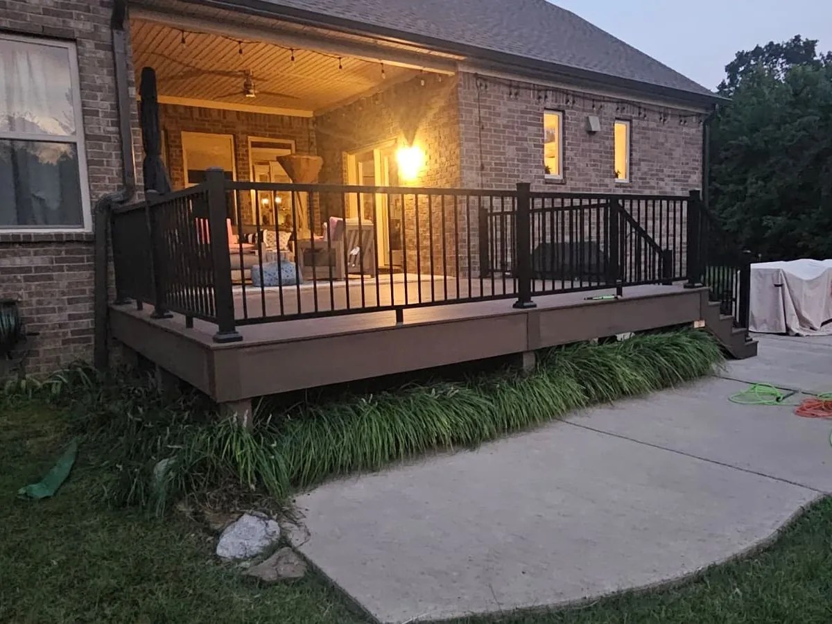 Finished composite deck with black aluminum railing