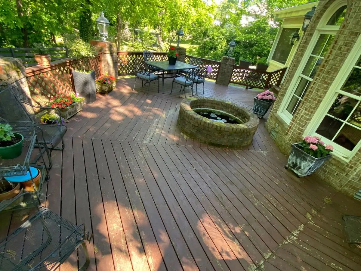 Worn weathered deck boards before replacement